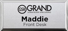 Executive name badge for Maddie, Front Desk