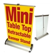 Mini Table Top Retractable Roll Up Banners Stand | https://www.bestnamebadges.com