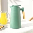 Warm Water Kettle With Wooden Handle | https://www.bestnamebadges.com