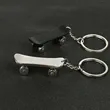 Skateboard keychain | https://www.bestnamebadges.com