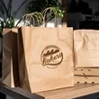 Twisted Handle Kraft Shopper Bag | https://www.bestnamebadges.com