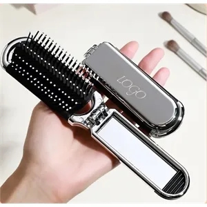 Folding massage comb