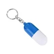 Plastic Rotatable Body Capsule Keychain | https://www.bestnamebadges.com