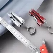 Mini LED Keychain Pliers With Knife Screwdriver Bottle | https://www.bestnamebadges.com