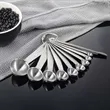 10 Piece Stainless Measuring Spoon Set With Ounce Scale | https://www.bestnamebadges.com