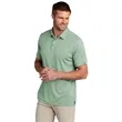 TravisMathew Coto Performance Polo. | https://www.bestnamebadges.com