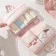 Multi-Compartment Hanging Travel Toiletry Storage Bag. | https://www.bestnamebadges.com