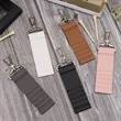 Portable Leather Golf Tee Holder Pouch With Keychain | https://www.bestnamebadges.com