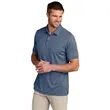 TravisMathew Coto Performance Polo. | https://www.bestnamebadges.com
