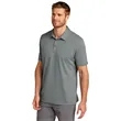 TravisMathew Oceanside Solid Polo. | https://www.bestnamebadges.com