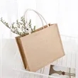 Carrying burlap bags | https://www.bestnamebadges.com