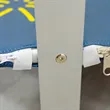 Corrugated Spring Stand | https://www.bestnamebadges.com