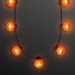 Big Pumpkin Light Bulbs Halloween Necklace | https://www.bestnamebadges.com