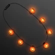 Big Pumpkin Light Bulbs Halloween Necklace | https://www.bestnamebadges.com