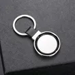 Round Metal Keychain with Leather Strap | https://www.bestnamebadges.com