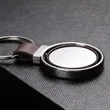 Round Metal Keychain with Leather Strap | https://www.bestnamebadges.com